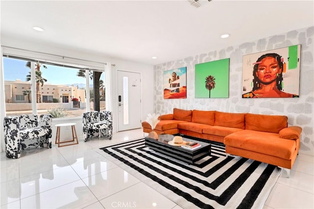 living area featuring wallpapered walls, tile patterned flooring, and recessed lighting