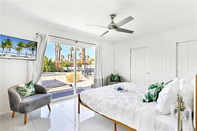 bedroom with access to outside, a closet, light tile patterned flooring, and a ceiling fan