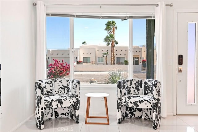 living area with light tile patterned flooring