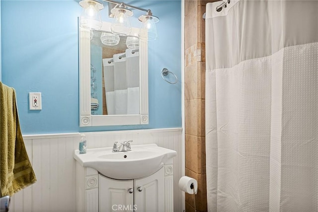 bathroom with vanity and walk in shower