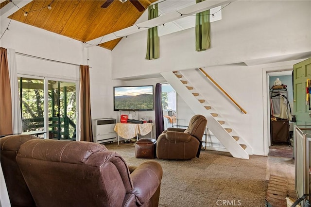 living room with carpet, plenty of natural light, high vaulted ceiling, and wood ceiling