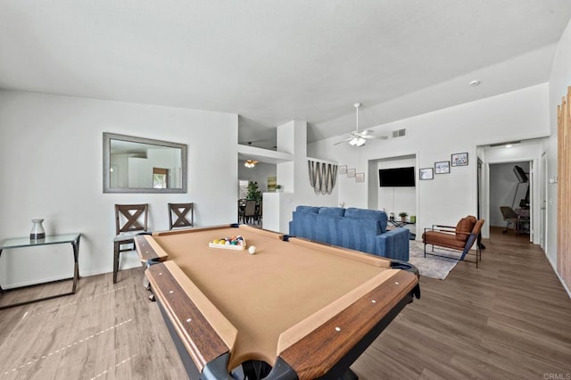 game room with ceiling fan, billiards, vaulted ceiling, and hardwood / wood-style floors