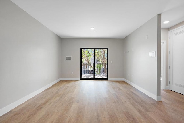 empty room featuring light hardwood / wood-style floors