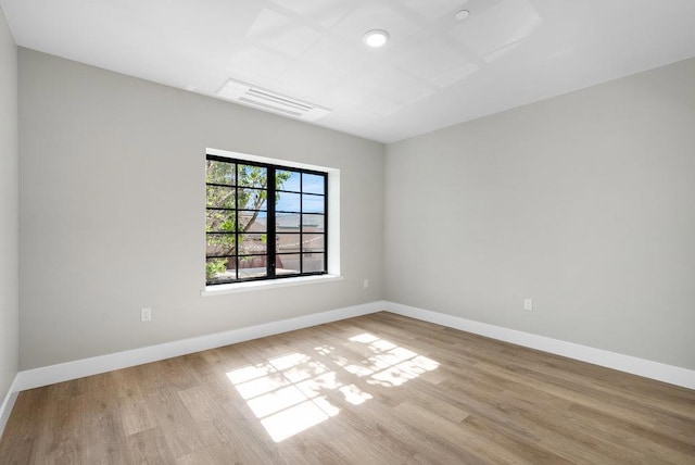 unfurnished room featuring light hardwood / wood-style floors