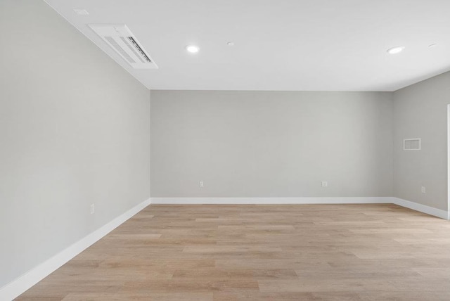 empty room featuring light hardwood / wood-style floors