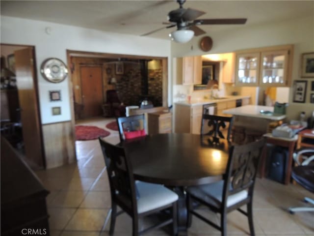 dining area with ceiling fan and light tile patterned flooring