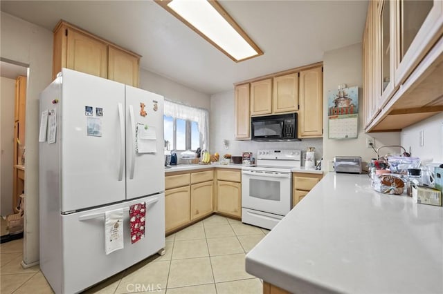 kitchen with light tile patterned floors, light brown cabinetry, and white appliances