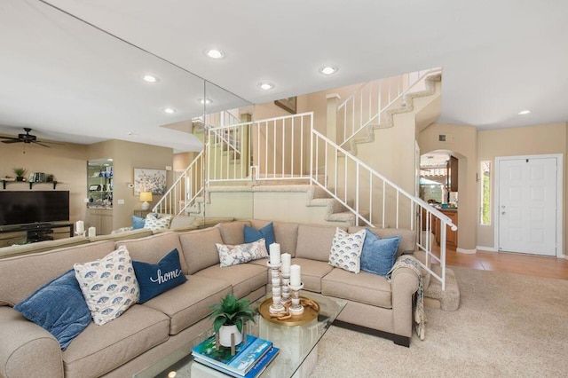 living room with ceiling fan