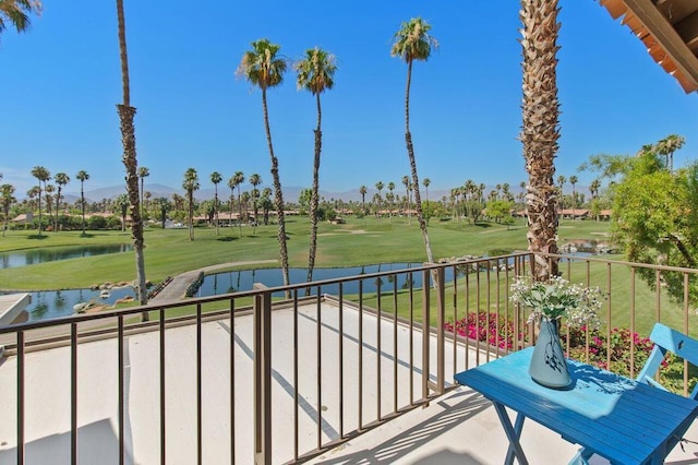 balcony featuring a water view