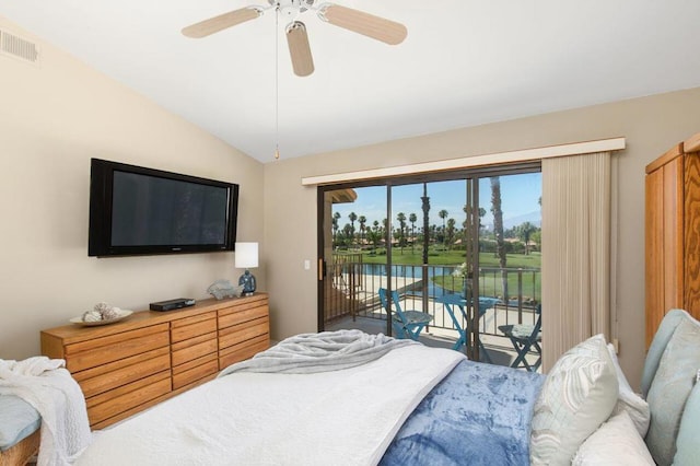 bedroom with access to outside, vaulted ceiling, and ceiling fan