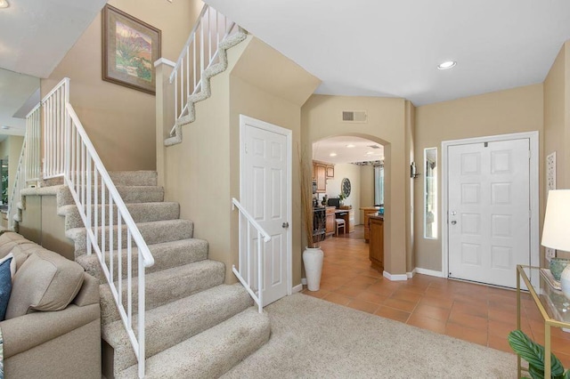 entrance foyer featuring light tile patterned floors