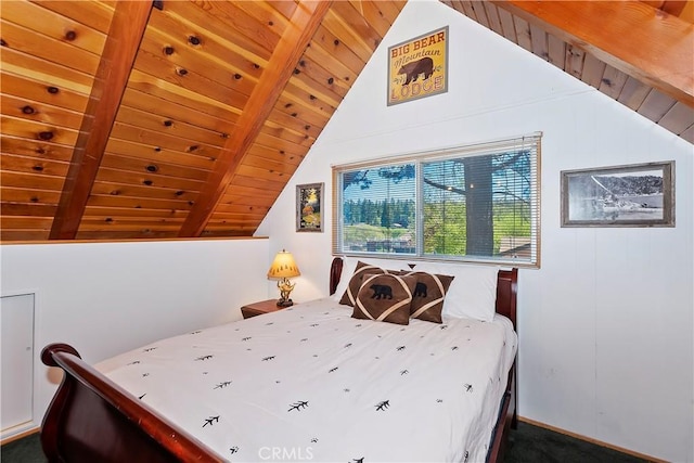 bedroom featuring vaulted ceiling with beams and wood ceiling