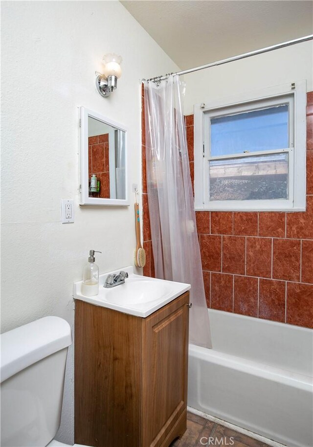 13115 Davenport St, North Edwards, CA 93523 - bathroom featuring vanity, toilet, and shower / bath combo