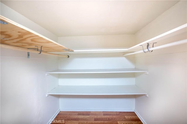13115 Davenport St, North Edwards, CA 93523 - walk in closet featuring wood finished floors