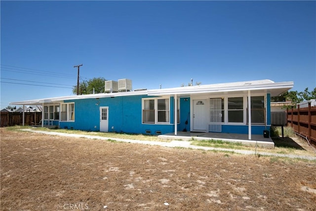 13115 Davenport St, North Edwards, CA 93523 - view of front of property featuring stucco siding and cooling unit