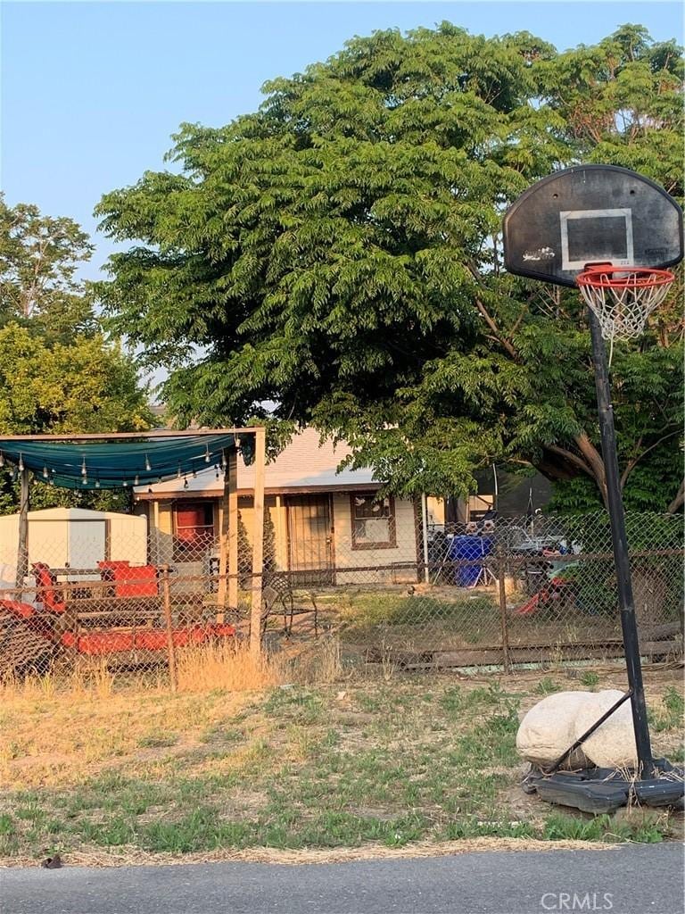 exterior space with basketball court