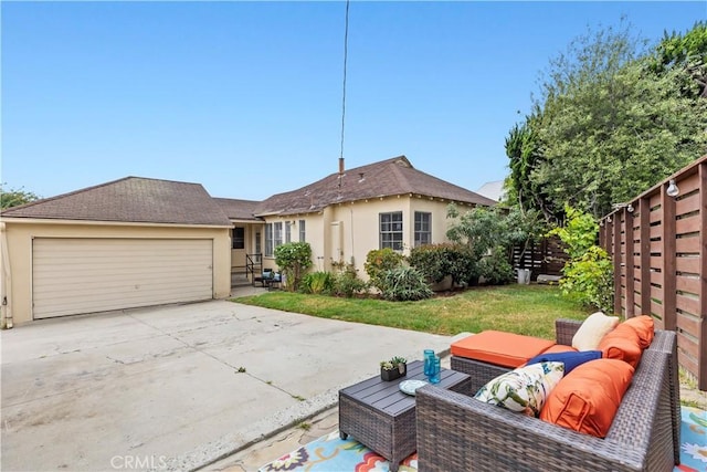 exterior space featuring a garage and a front yard