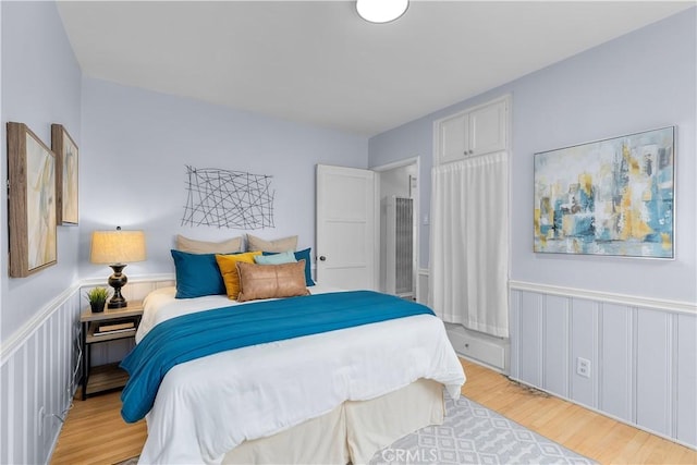 bedroom featuring light wood-type flooring