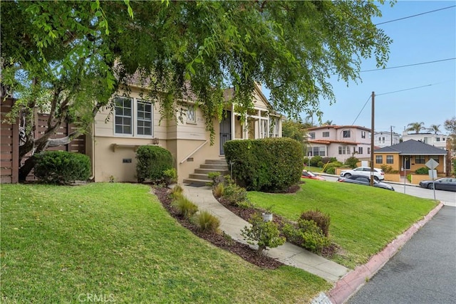 view of front of house with a front lawn