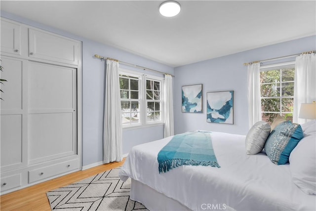 bedroom featuring light hardwood / wood-style flooring