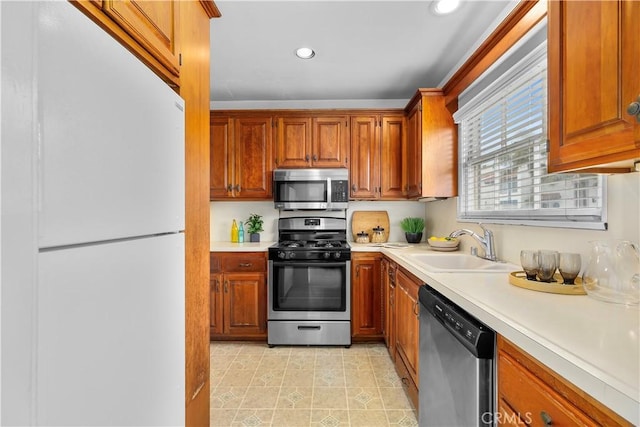 kitchen featuring stainless steel appliances and sink