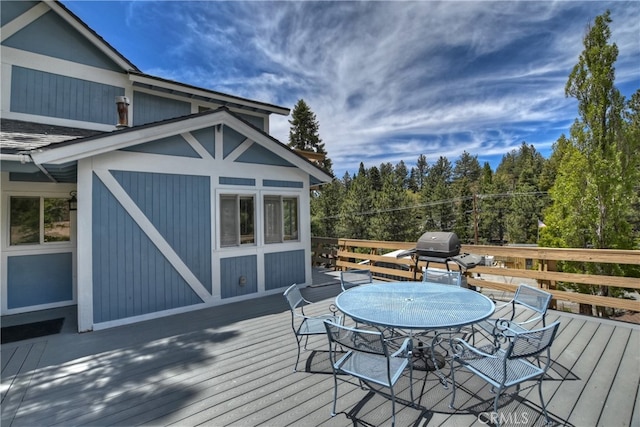 wooden deck with grilling area