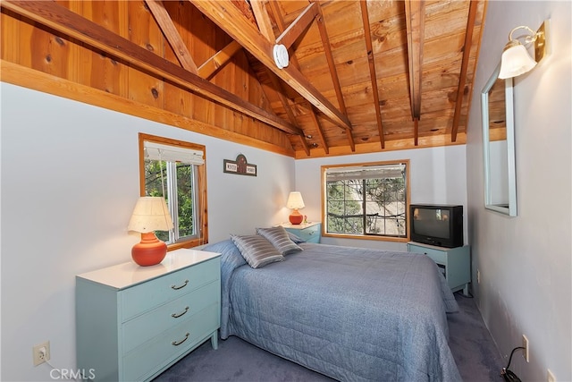 bedroom featuring wood ceiling, lofted ceiling with beams, carpet floors, and multiple windows