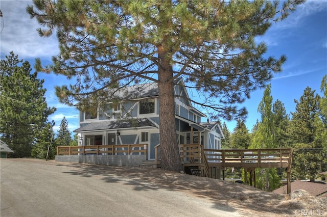 view of front facade with a deck