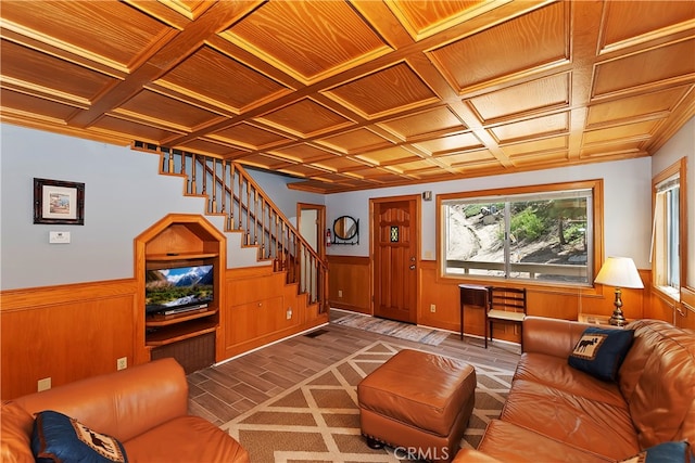 living room with wood-type flooring, coffered ceiling, beam ceiling, and wood ceiling