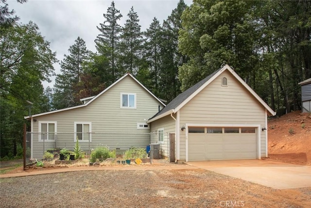 view of front of home with a garage