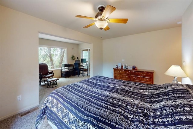 bedroom featuring ceiling fan and light colored carpet