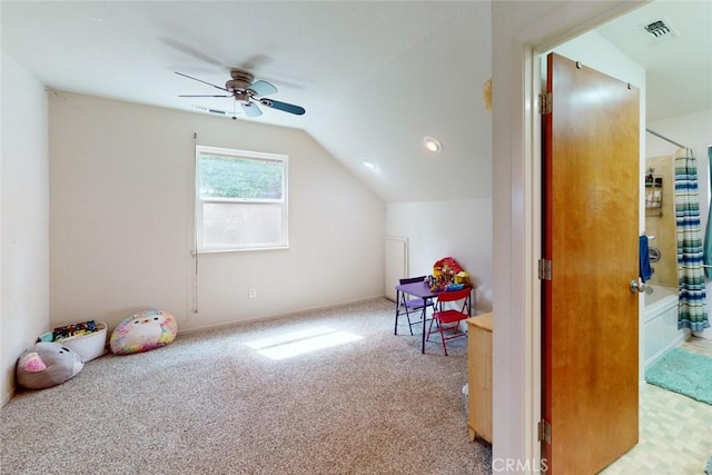 playroom featuring light carpet, ceiling fan, and lofted ceiling