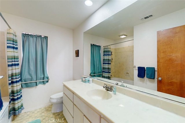 full bathroom with shower / bath combo with shower curtain, vanity, and toilet