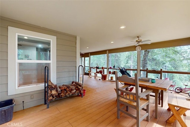 dining room featuring light hardwood / wood-style floors and ceiling fan