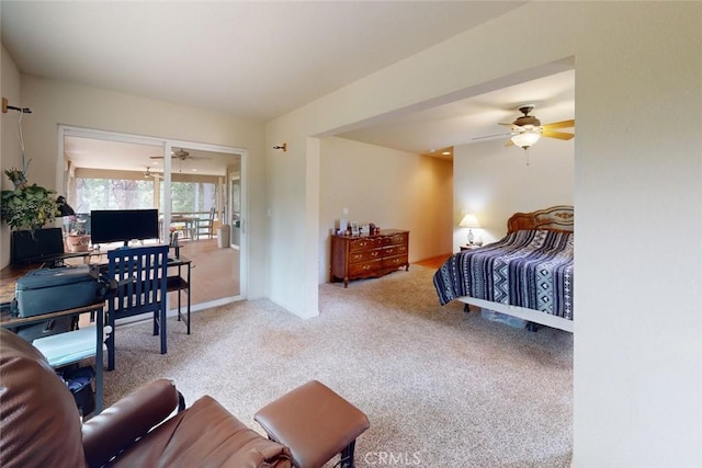 bedroom with light carpet and ceiling fan