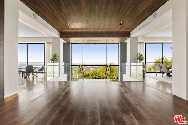 interior space featuring wood-type flooring and wooden ceiling