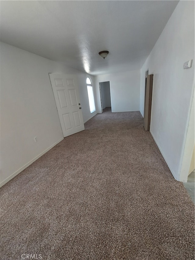 spare room with carpet flooring