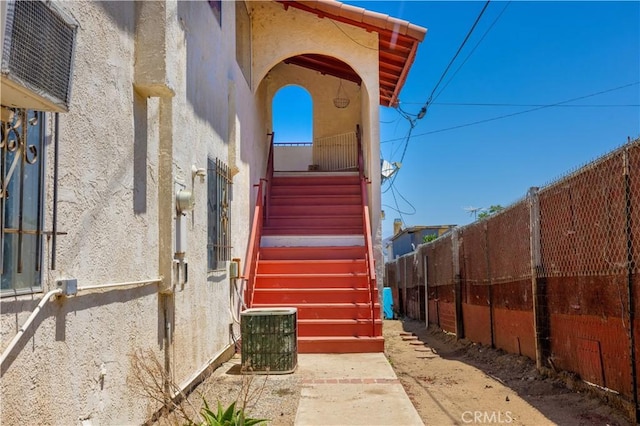 view of home's exterior with cooling unit