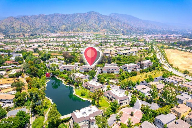 bird's eye view featuring a water and mountain view