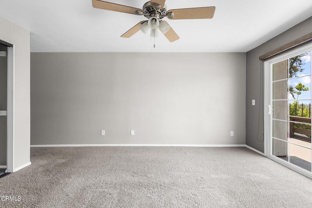 carpeted empty room with ceiling fan