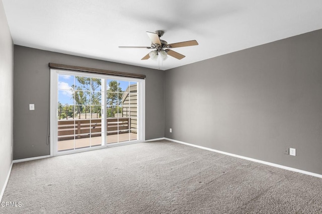 unfurnished room featuring carpet and ceiling fan