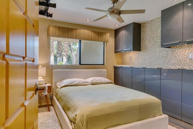 bedroom featuring ceiling fan