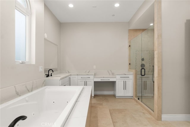 bathroom featuring tile patterned floors, vanity, and independent shower and bath