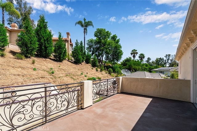 view of patio / terrace with a balcony