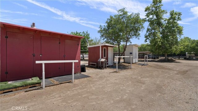 exterior space with an outbuilding