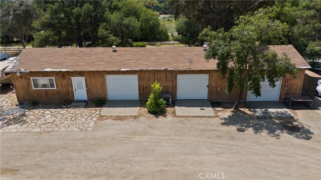 ranch-style home with a garage