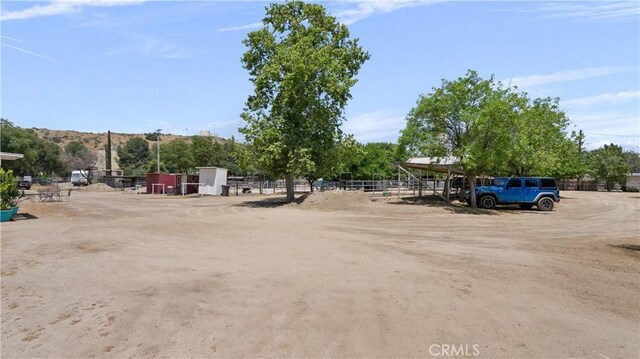 view of parking / parking lot