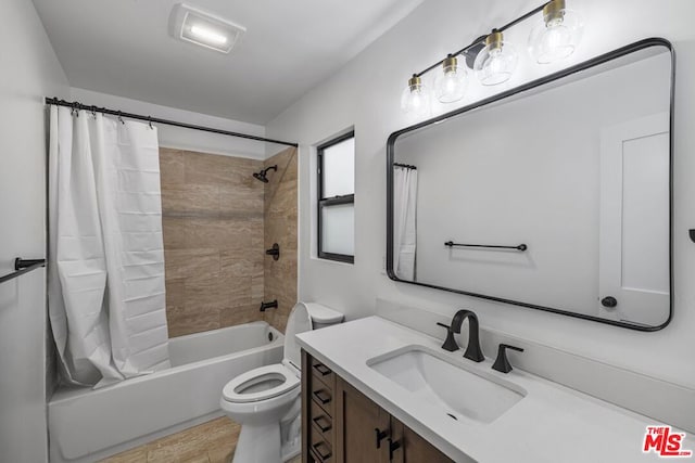 full bathroom with hardwood / wood-style floors, shower / tub combo with curtain, toilet, and vanity