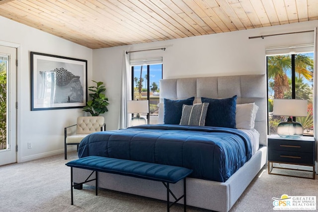 bedroom featuring light carpet and wooden ceiling