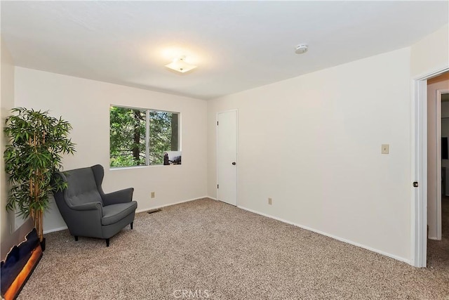 unfurnished room featuring carpet floors